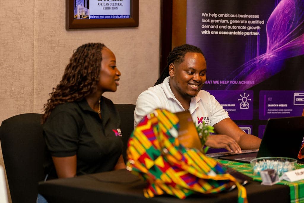 The Nuru Digital team welcoming visitors to the exhibition