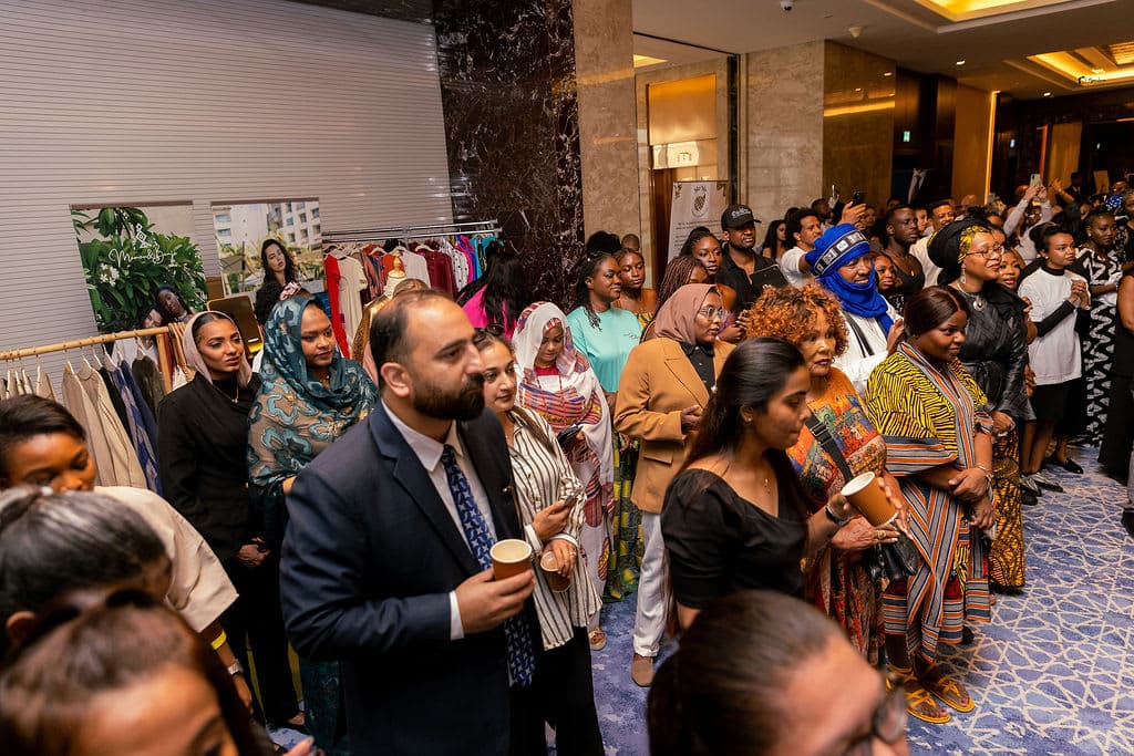 Guests queuing to enter the AfroMaya African Cultural Exhibition