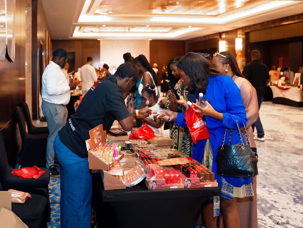 Guests browsing the Zikel Cosmetics stall
