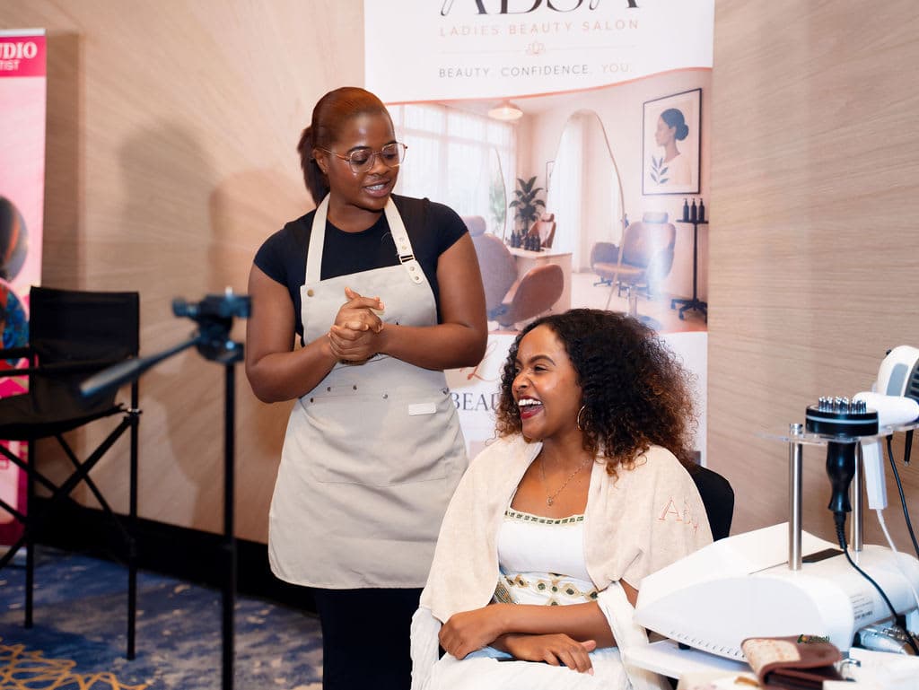 A guest enjoying a treatment at the ABSA Ladies Beauty Salon stand